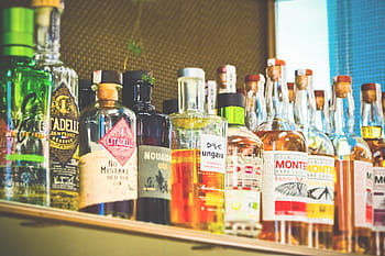 bottles, alcohol, drink, beverages, glass, bar, restaurant, shelf, mixed drinks, cocktails, celebrate